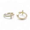 Gold earrings with cross design