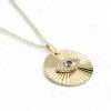 Gold pendant with eye design