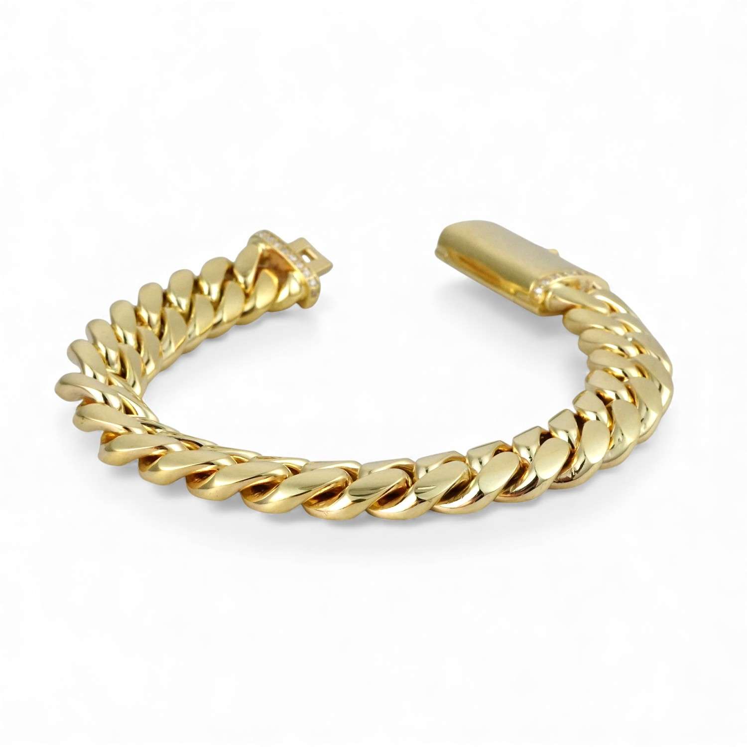 10K Yellow Gold Cuban Link Bracelet 1 Gold chain bracelet on white background