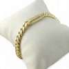Gold chain bracelet on display