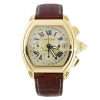 Gold Cartier watch with leather strap