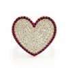 Heart-shaped ring with gemstones.