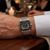 Elegant watch on a dining table.
