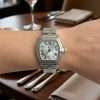 Silver Cartier watch on wrist