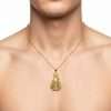 14k Yellow Gold Regla Virgin Pendant 4 Gold pendant on bare chest
