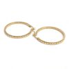 Gold hoop earrings with textured design