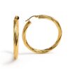 Twisted gold hoop earrings displayed